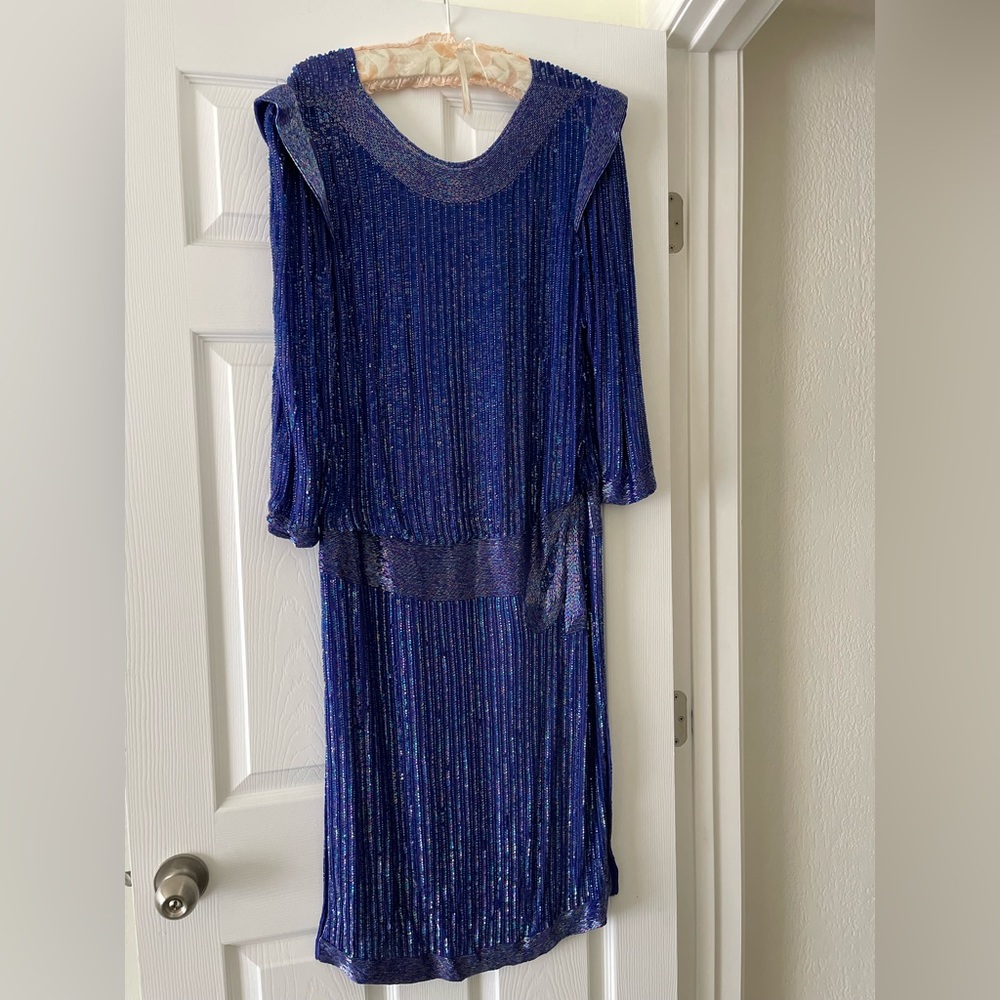 Beautiful sequin 100% silk purple dress. Size small. Excellent condition.